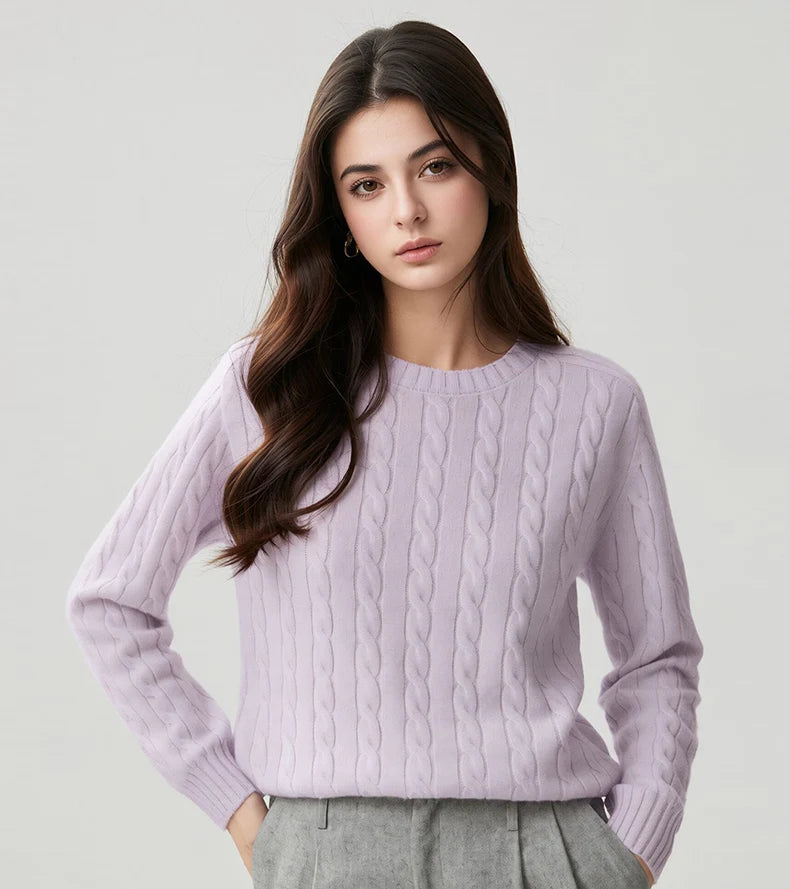 A woman wears a wool-cashmere lavender sweater