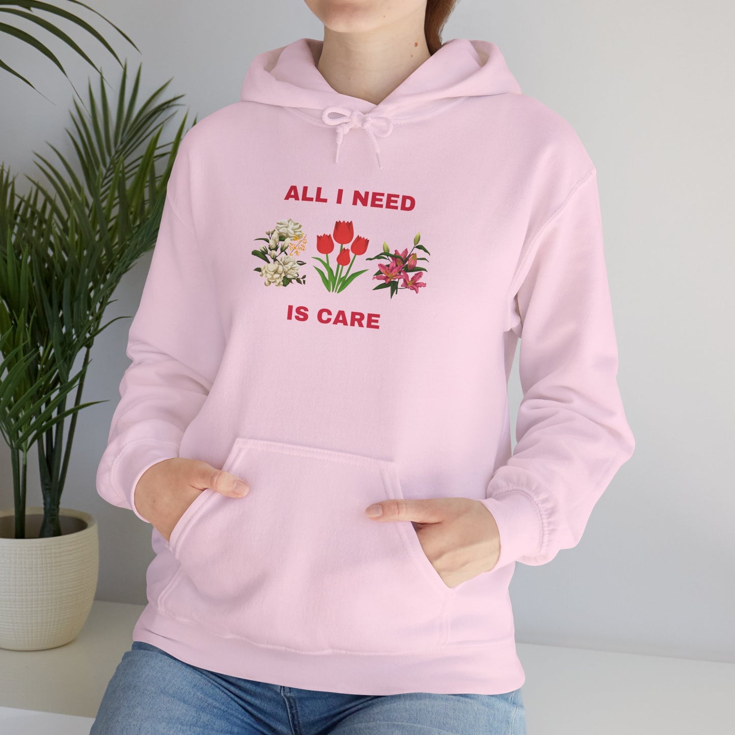 All I Need Is Care Exclusive Hooded Sweatshirt