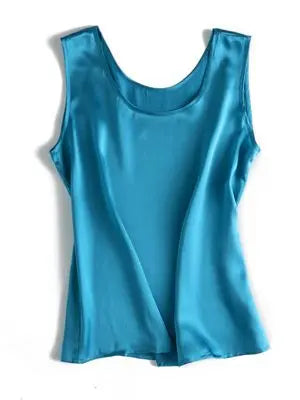 Blue sleeveless silk top on a white background