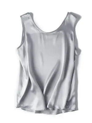 Silver sleeveless silk top on a white background
