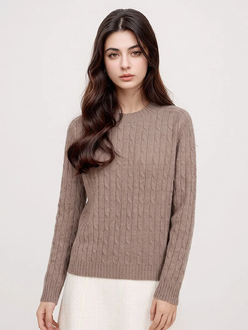 A woman wears a wool-cashmere khaki sweater 